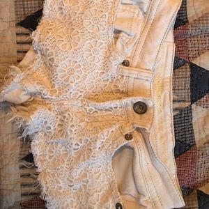 White lace shorts