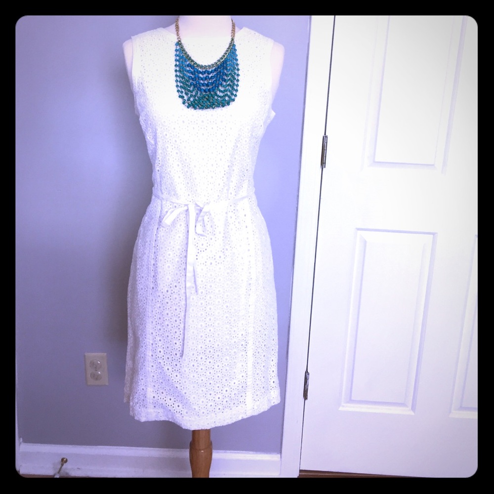 White eyelet dress. Necklace not included.