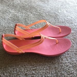 Coral-pink Crocs Sandals