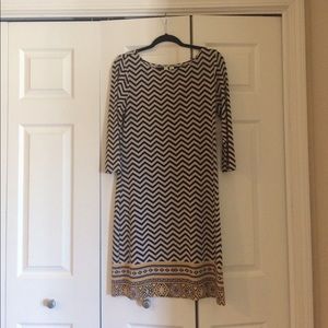 Deep navy, beige, and yellow tribal print dress