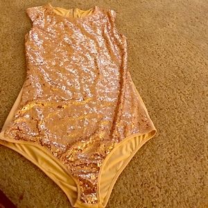 Rose gold sequin bodysuit NWOT. Never worn