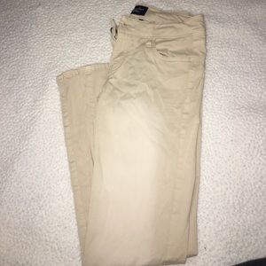 khaki colored skinny pants