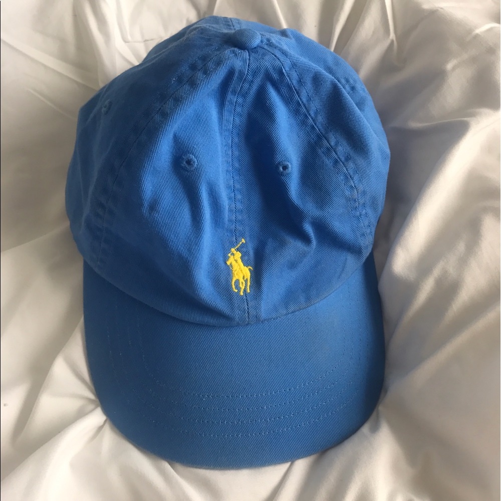 Blue polo hat with yellow horse