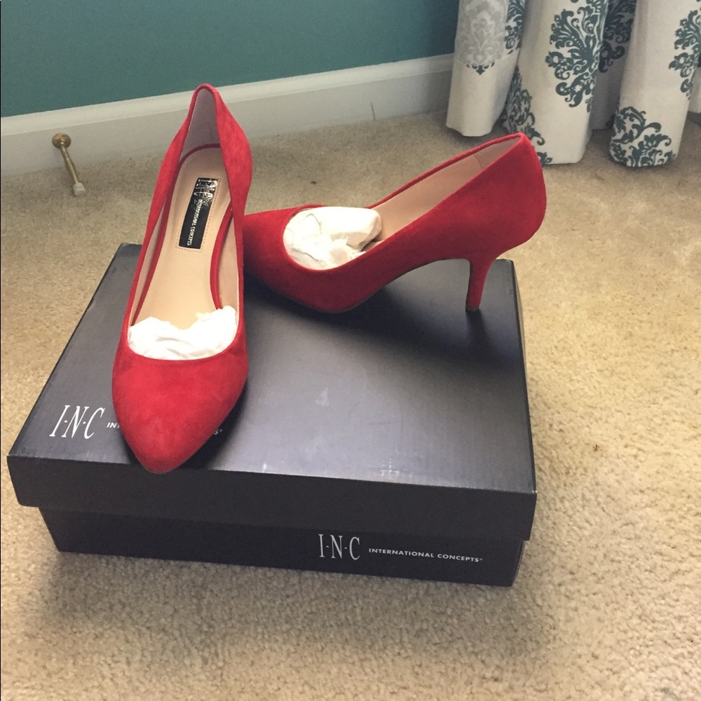 Red suede pumps