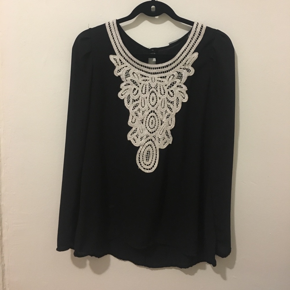 Black long sleeve blouse with crochet details