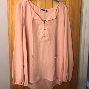 Pink blouse with gold buttons