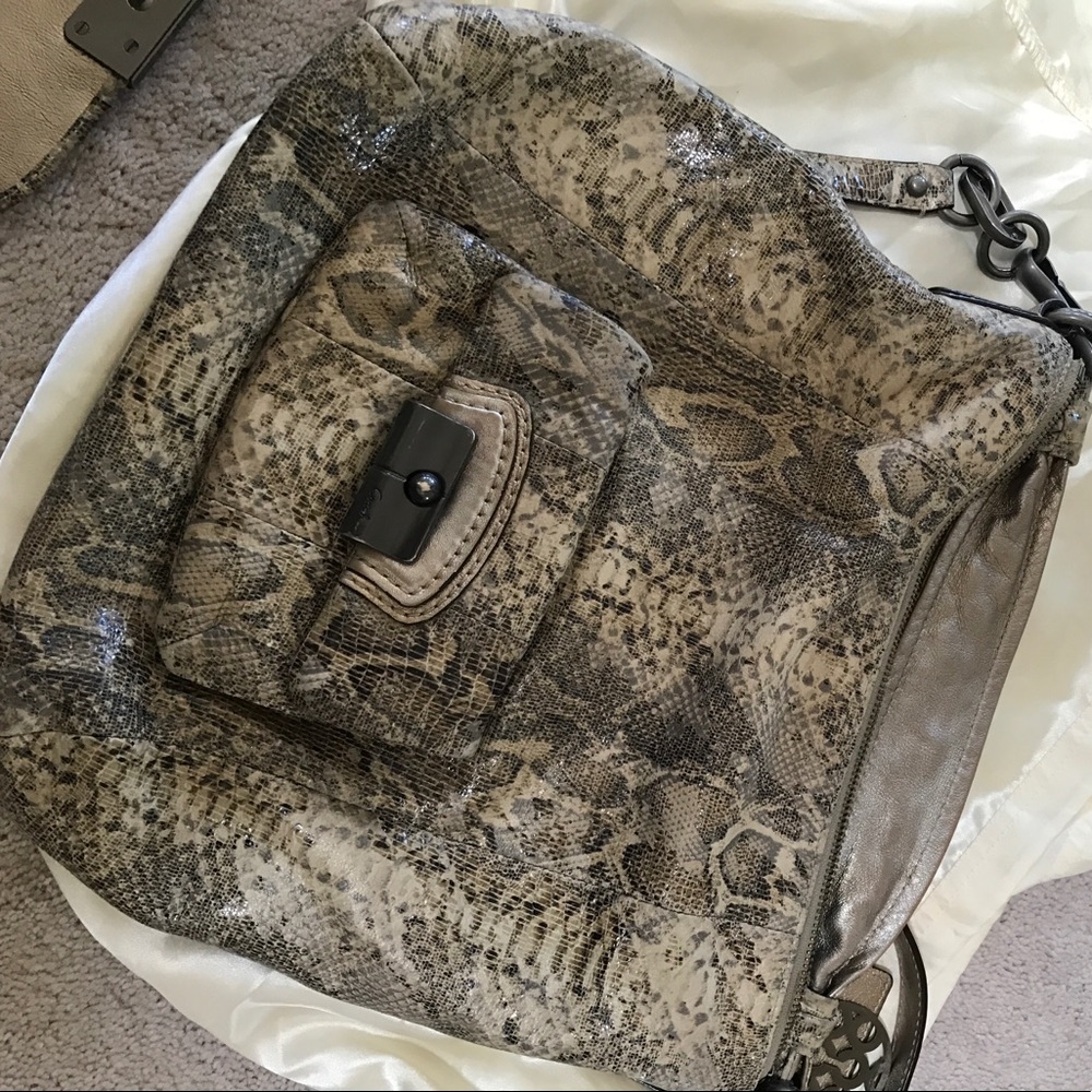 Gently Used Coach Leather Python Print. - image 1