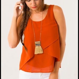 Sleeveless, layered rust top