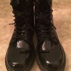 Black doc martens Delaney style.