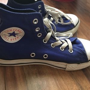 Bright blue high top Converse sneakers