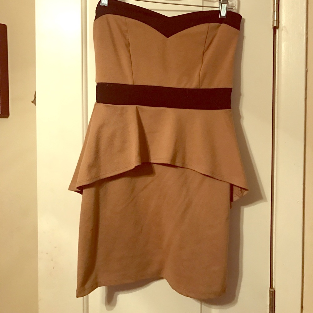 Tan and black peplum dress