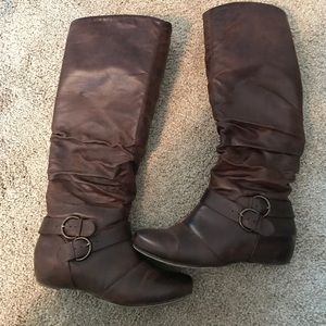 Flat brown leather boots