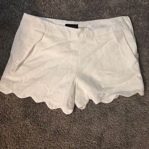 Scalloped bottom white linen shorts