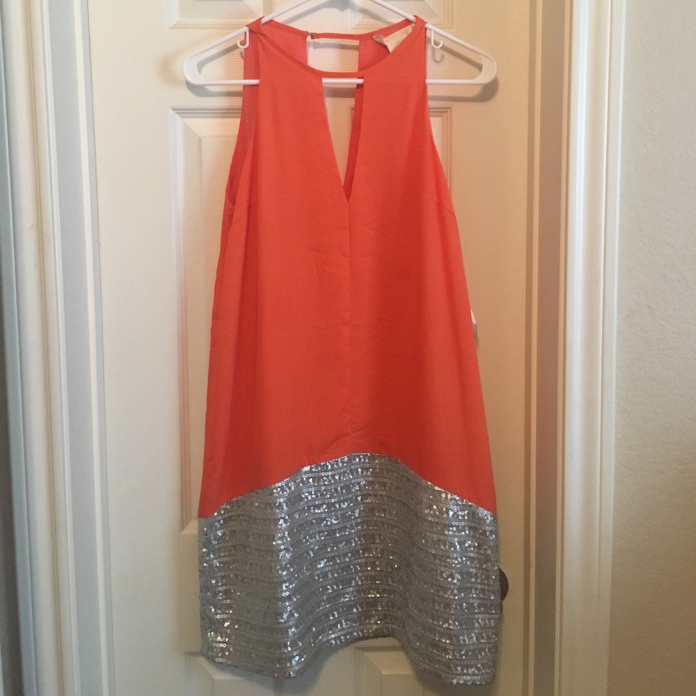Orange and sequin dress