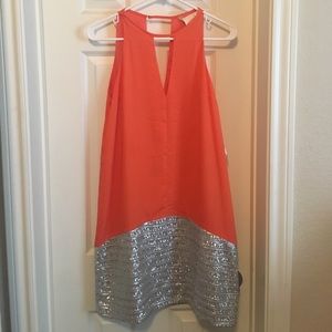 Orange and sequin dress