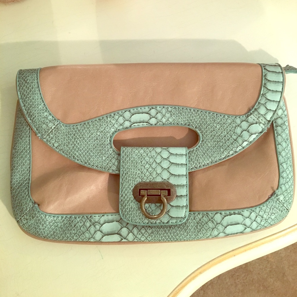 Tan and aqua clutch.