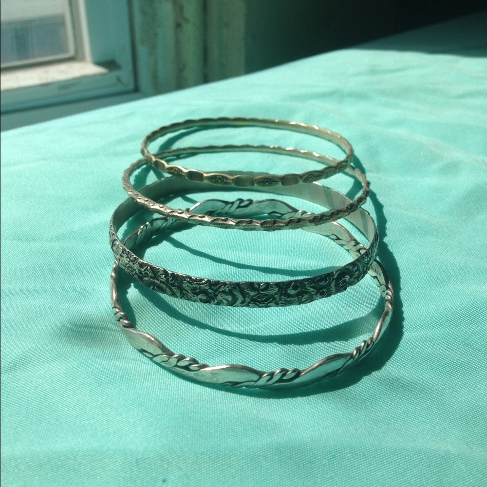 Assorted silver bangles