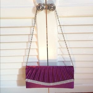 Purple chain handbag or clutch