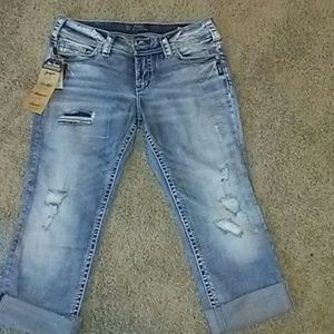 Whit washed ripped capri jeans