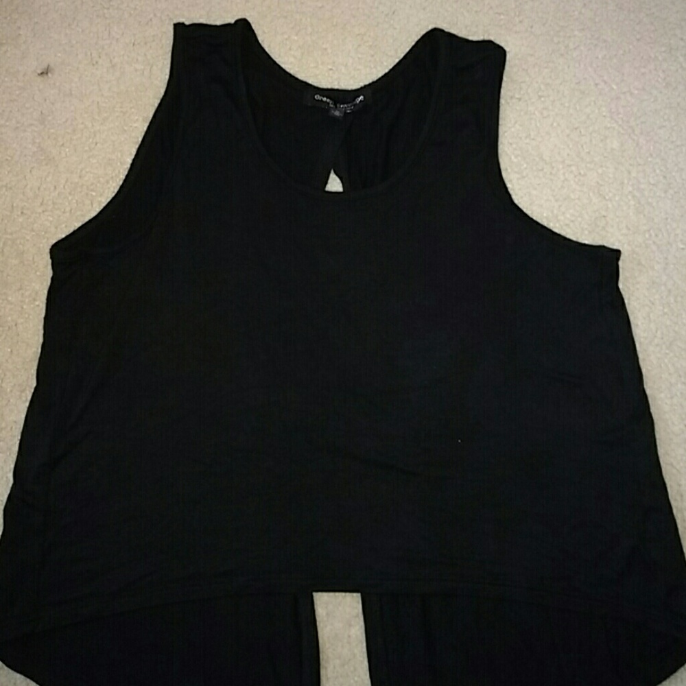 Green envelope black crop top in front.