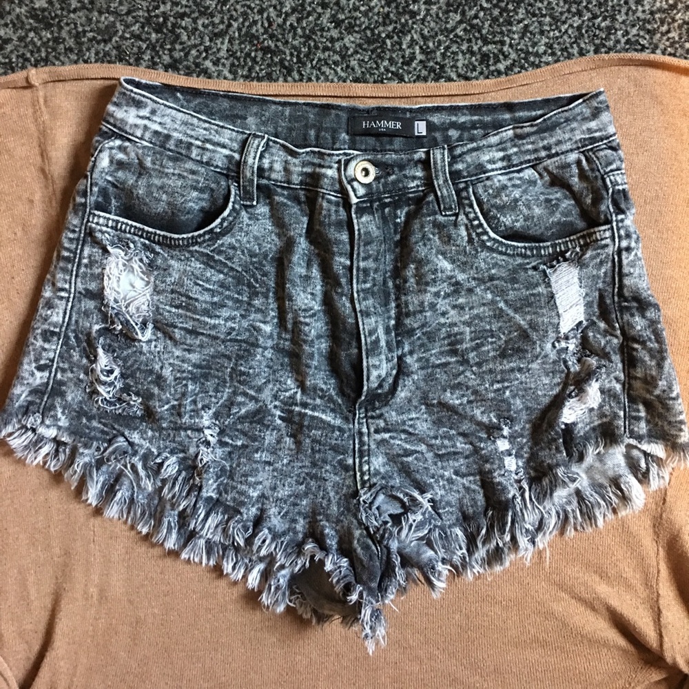 High waisted distressed stretch denim shorts.