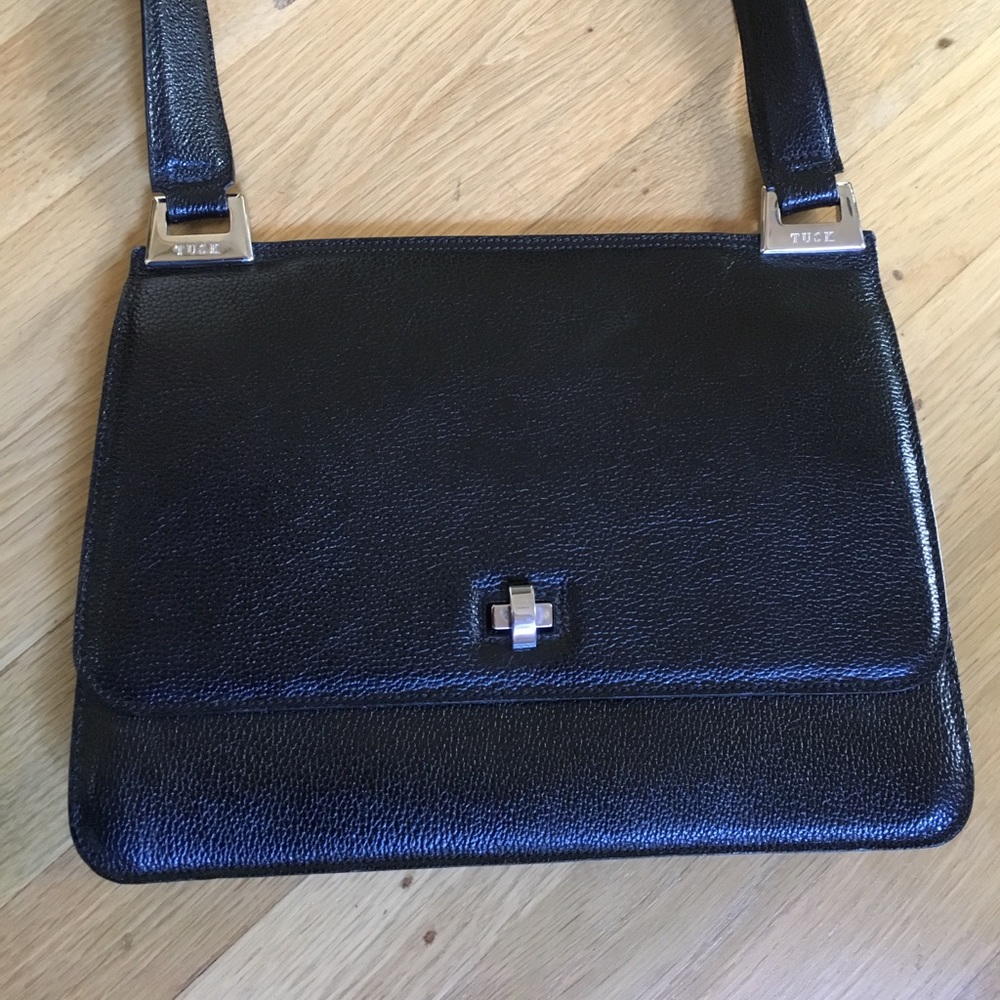 tusk cross body bag
