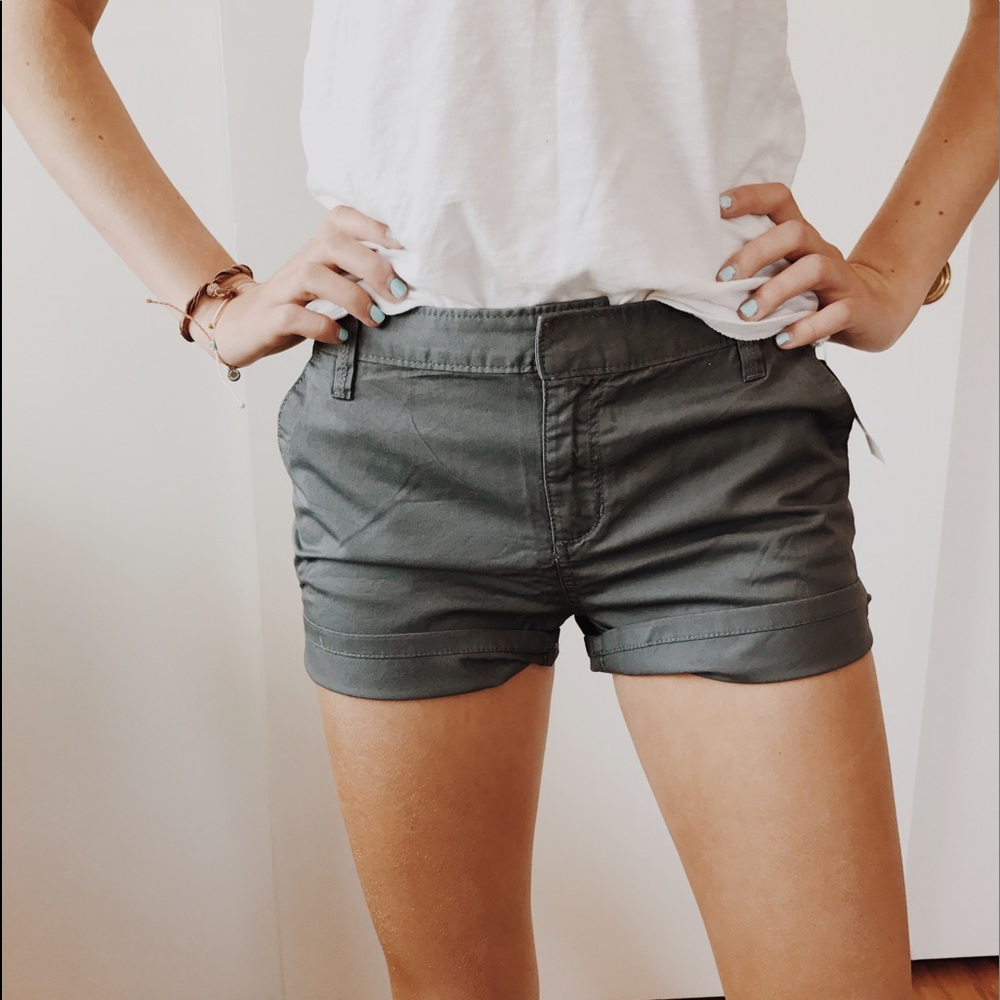 Grey shorts.