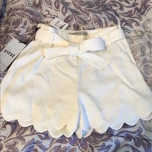 White scalloped shorts