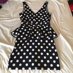 Navy and white polka dot peplum dress