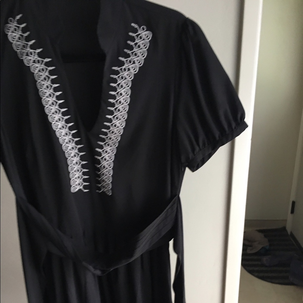 Black dress with white detail.