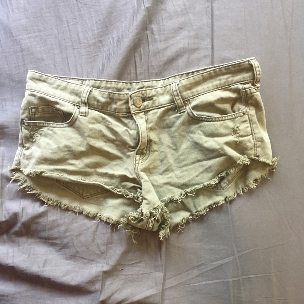 BDG green denim dolphin shorts size 29