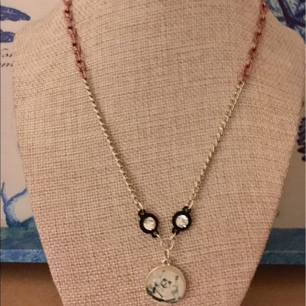 Cat cameo pendant.