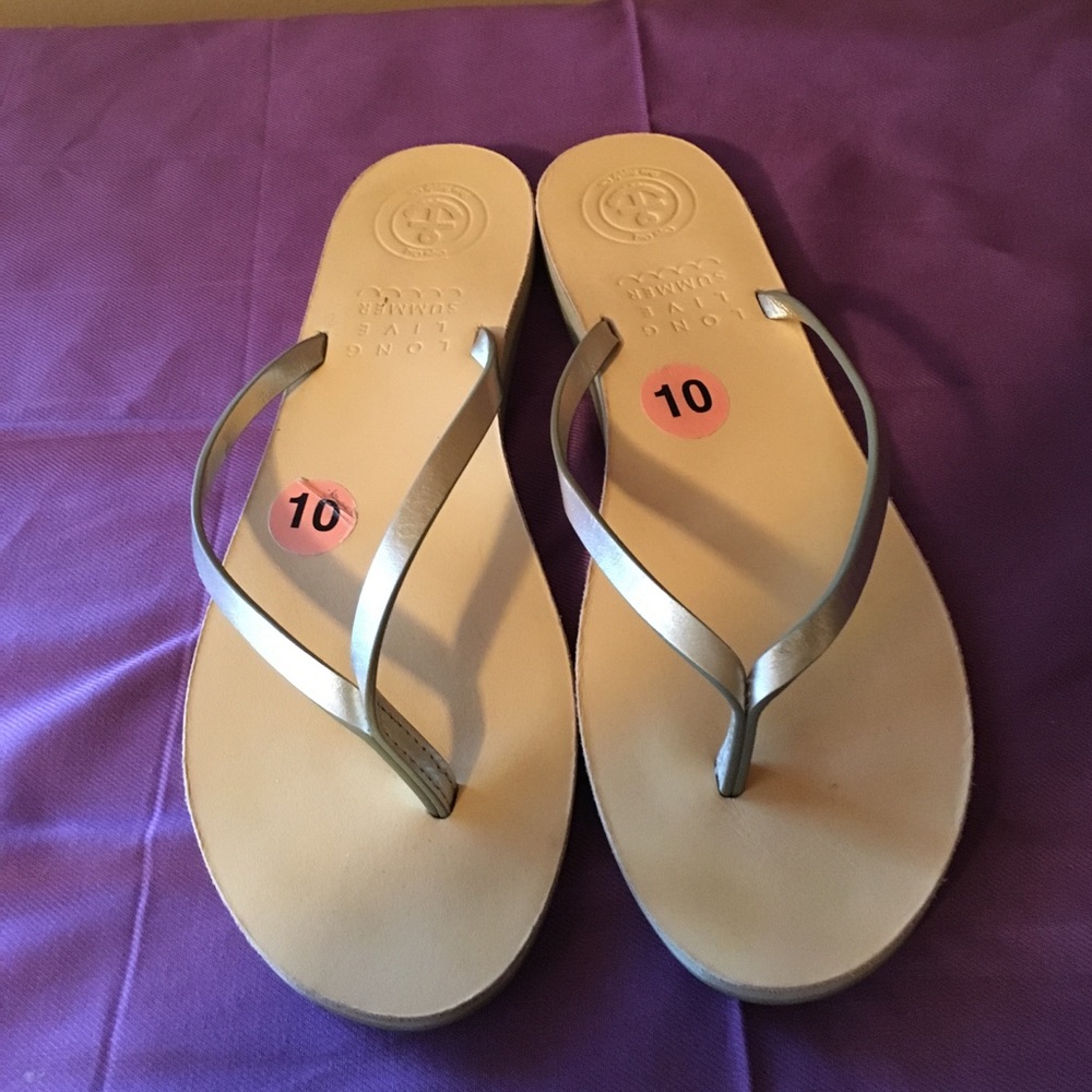 Gold flip-flop sandals