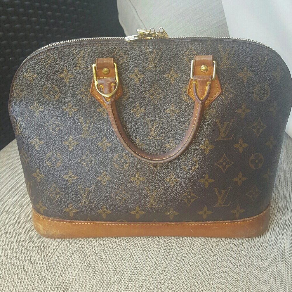 Louis Vuitton Alma Handbag