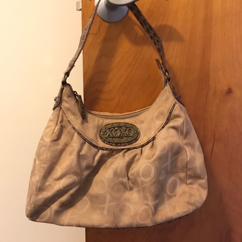 XOXO tan hand bag