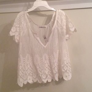A brand new lacy shirt