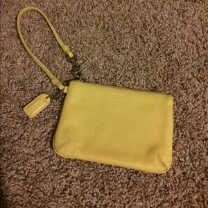 Coach yellow leather wristlet