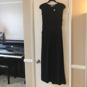Black sleeveless midi dress.
