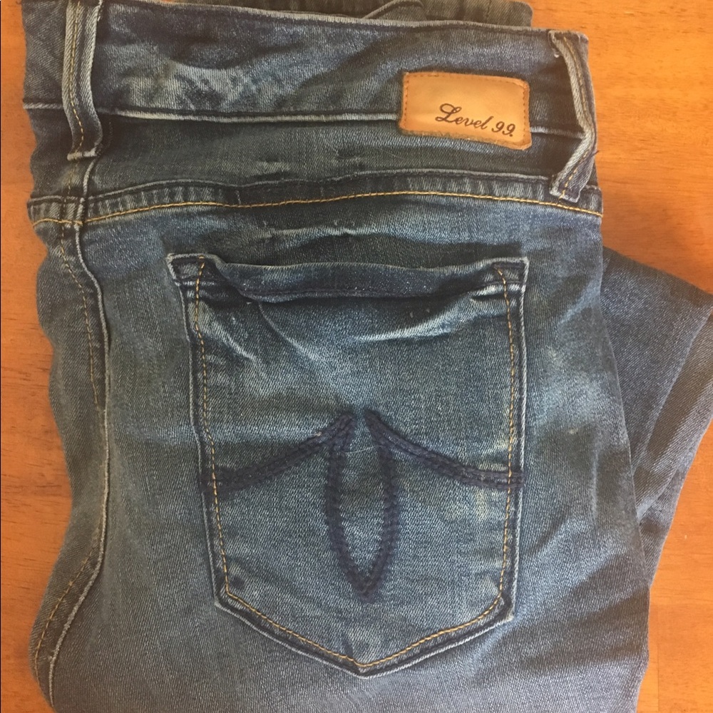 Level 99 medium wash denim jeans
