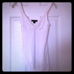 Soft white flowy asymmetrical tank.