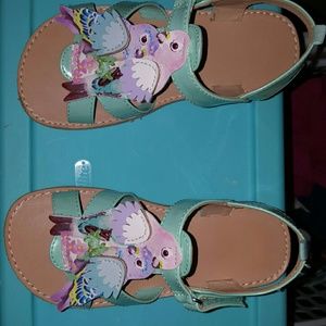 Beautiful teal bird leather detail sandals