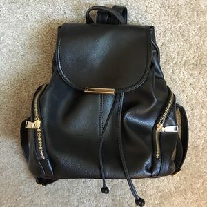 Black drawstring mini backpack