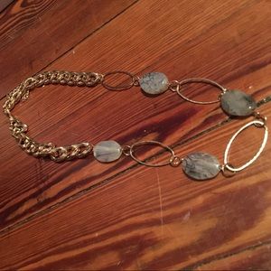 Gold and smooth gray agate necklace.