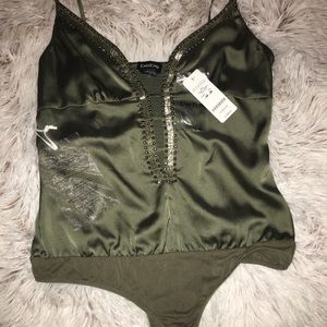 BEBE EMBELLISHED SLIT FRONT BODYSUIT