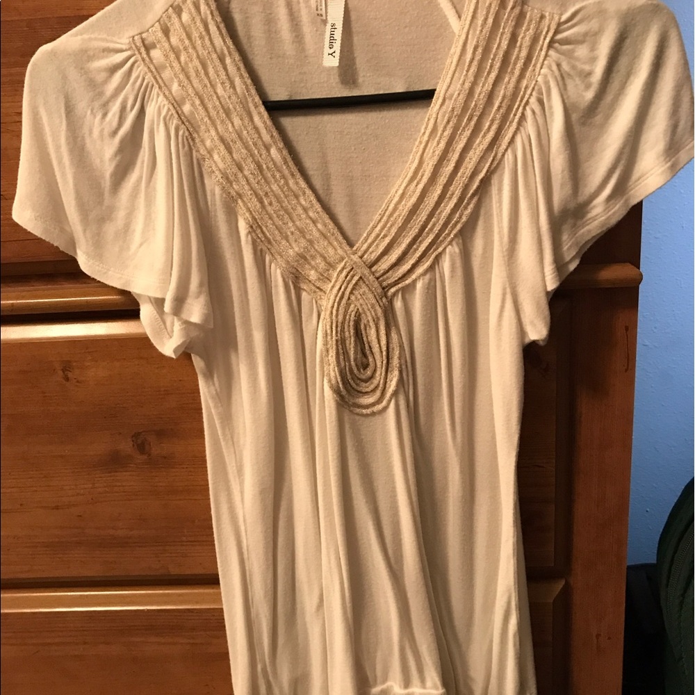 white and gold blouse