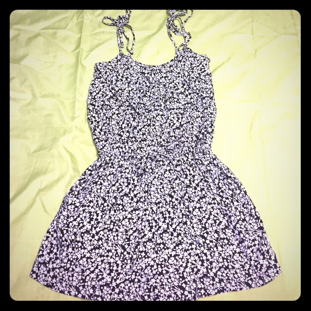 Floral romper with tie waist and shoulder straps