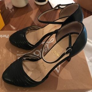 Christian Louboutin En Passant Heels in Black.