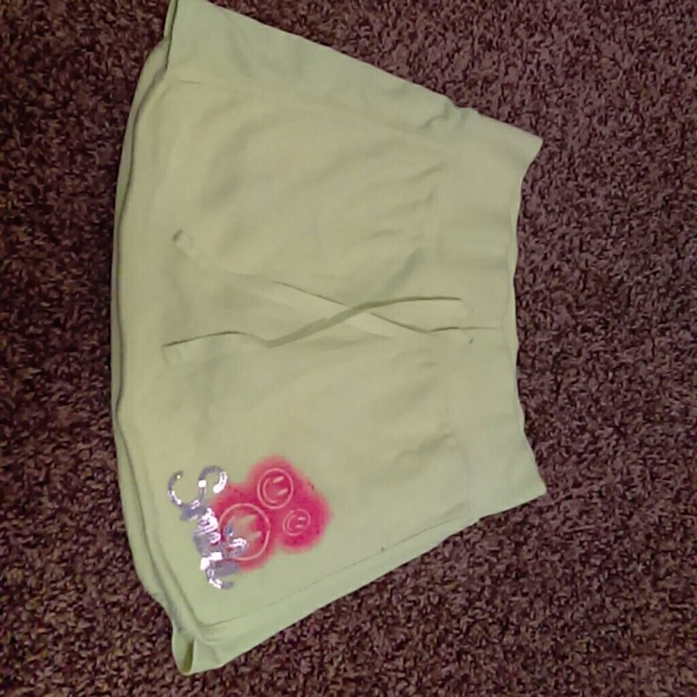 Neon green yellow skirt with short  on the bottom