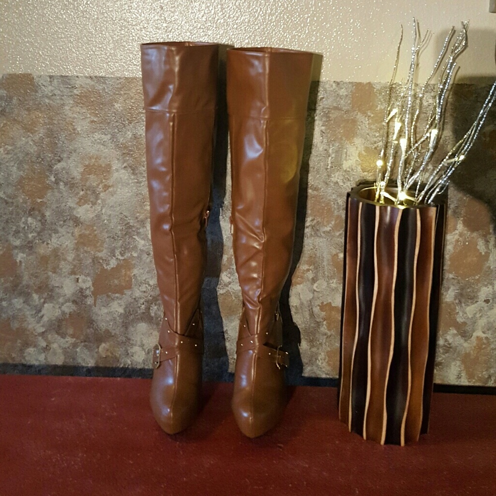 Cognac over the knee heeled boot.