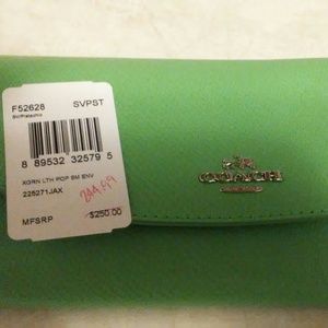 Wallet made by  Coach